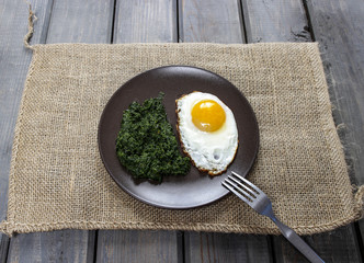 Egg with spinach  for healthy breakfast.