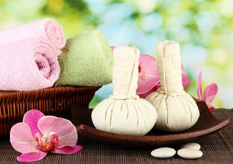 Textile massage spa equipment on nature background