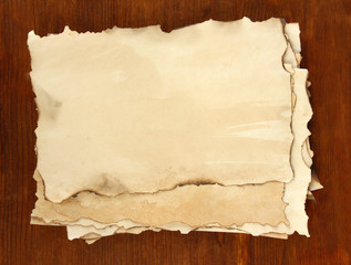 Old paper on wooden background