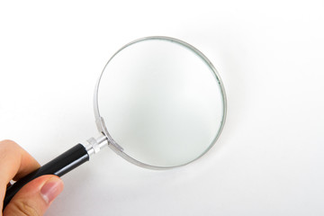 Hand Holding Magnifying Glass