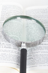 Magnifying Glass and Dictionary