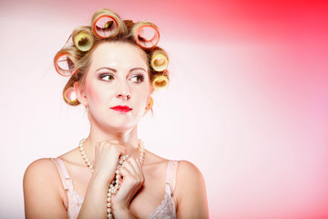 sexy woman in underwear curlers with beads