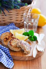 Chicken cutlets with lemon, selective focus