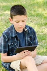 child with tablet