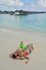 happy young  couple at summer vacation have fun and relax