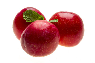 Bright ripe plum with mint