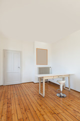 home interior, view table in a room with white walls
