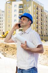 Construction manager holding project