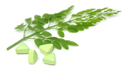 Edible moringa leaves with pills