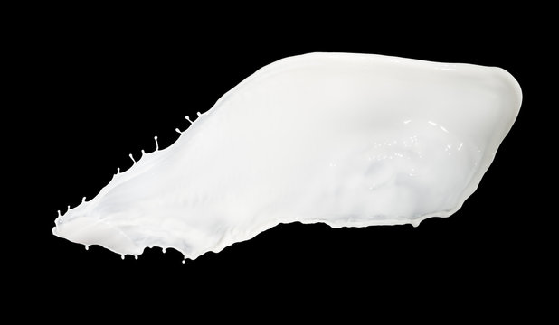 milk flow splash isolated on black background