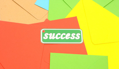 message of success on colorful envelopes