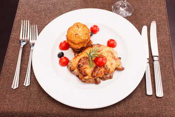 meat with potato pancakes