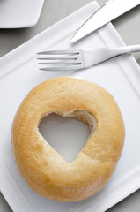 bagel with a heart-shaped hole