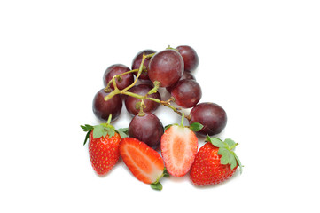 Strawberries and grapes isolated on white background