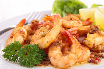close up on cooked shrimp and parsley