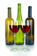 Bright colorful wine bottles and glass