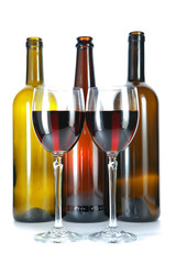 Bright colorful wine bottles and glass