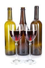Bright colorful wine bottles and glass