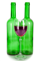 Bright colorful wine bottles and glass