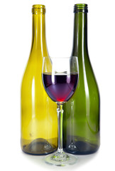 Bright colorful wine bottles and glass