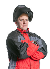 Portrait of man in working clothes and a welder mask