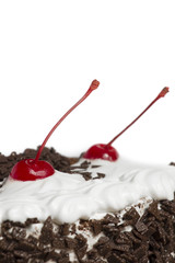 Cake with cherry isolated on white