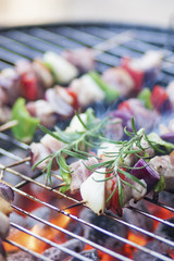 Meat and vegetables on barbecue