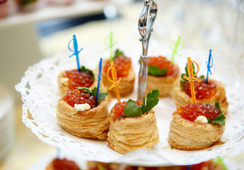 Tartlets with red caviar