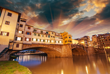 Florence, Italy. Wonderful sunset above Magnificent Ponte Vecchi