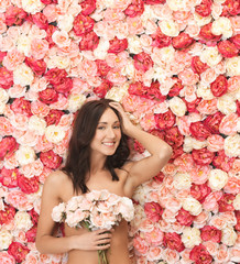 woman and background full of roses