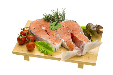 Raw fresh bright salmon with vegetables