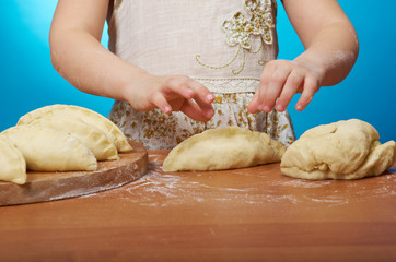  little girl kneading dough