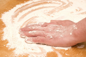 Fototapeta premium Hand and flour