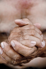 Fototapeta premium close up image of old man hand