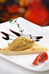 Appetizer Foie gras Pate on toast with balsamic vinegar