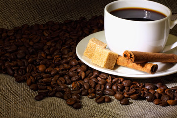 Coffee beans and white cup