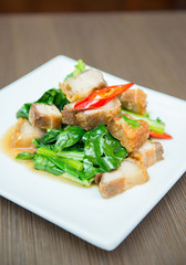 Stir fried kale with crispy pork - chinese food