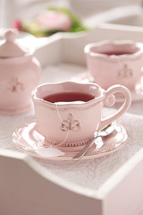 Tea on wooden tray