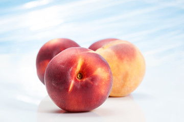 Peaches on abstract background
