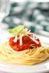 Spaghetti with tomato sauce and basil