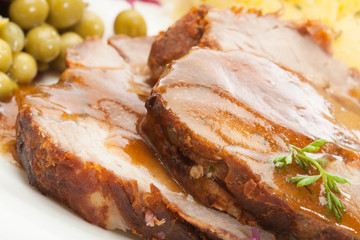 Roast pork with sauce. Selective focus.