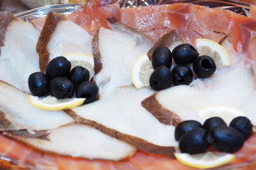 Splitting of salted fish on the festive table