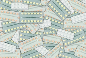 Obraz premium Abstract background of pink yellow and white pills in blister