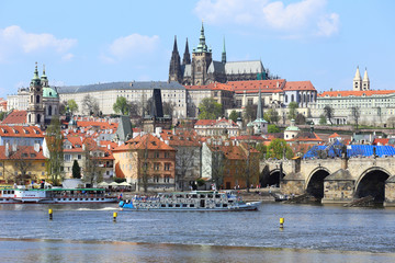 Obraz premium Spring Prague gothic Castle with Charles Bridge, Czech Republic