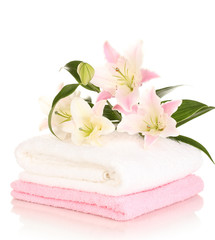 Obraz na płótnie Canvas beautiful lily on towel isolated on white