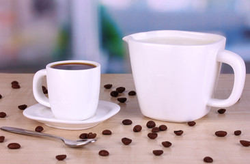 A cup of strong coffee and sweet cream