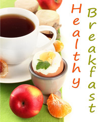 Light breakfast with boiled egg and cup of coffee, isolated