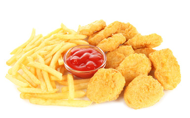 Fried chicken nuggets with french fries and sauce isolated