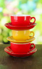 Three cups on nature background
