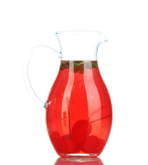 Cherry drink in pitcher isolated on white.